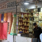 DELHI.  OLD   Bazaar Stalls  Sarees & Gold.JPG
